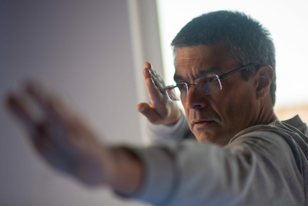 Forgetfulness vs Dementia: When to Worry About Memory Loss 3 Focused mature man in glasses practicing taijiquan